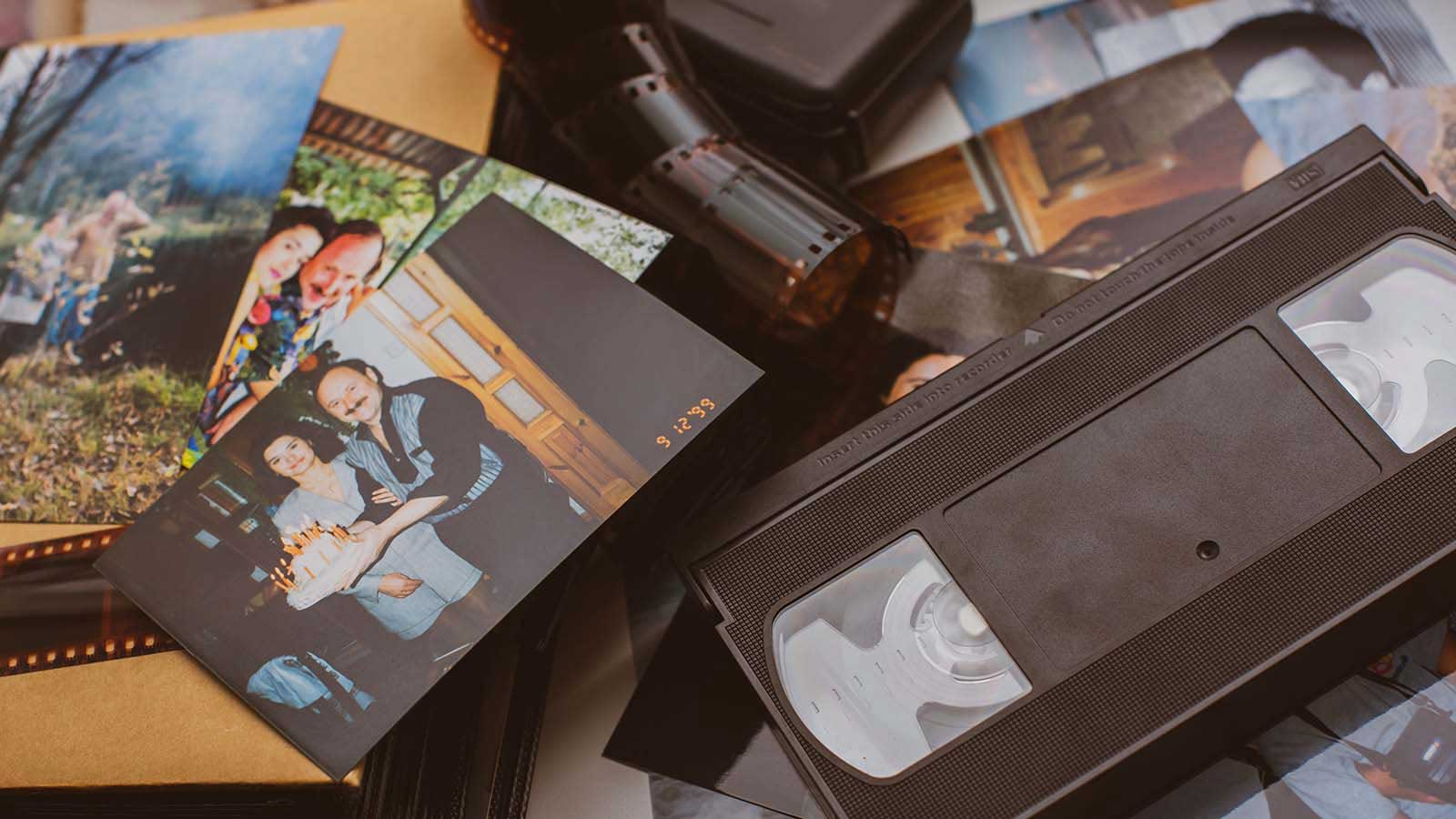 vhs tape, film negatives, and photos